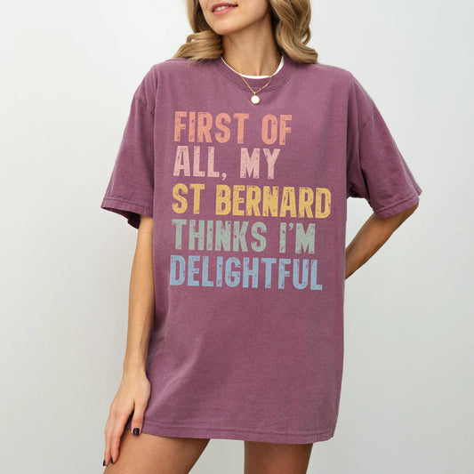 Model wearing a Berry Comfort Colors® T-shirt with “My St Bernard thinks I’m delightful” text