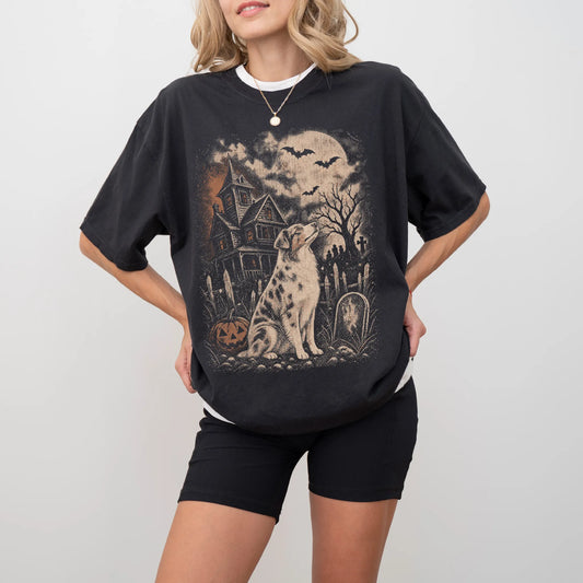 Model wearing a Black Comfort Colors® T-shirt showing Australian Shepherd in a vintage haunted-house scene