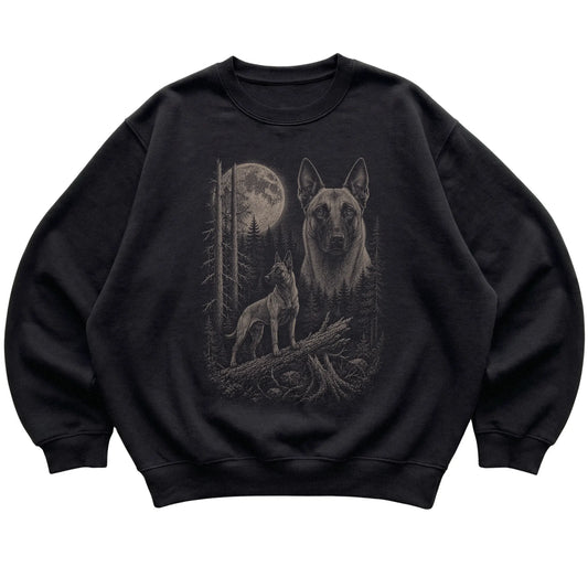Belgian Malinois Moonlit Forest graphic on a black crewneck sweatshirt laid flat