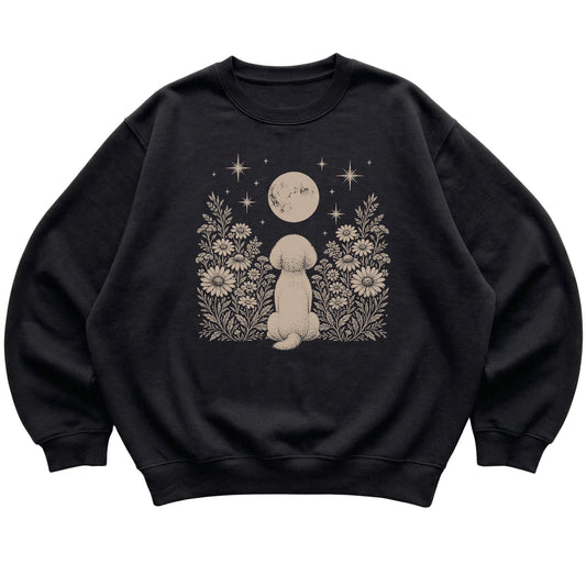 Black crewneck sweatshirt featuring Wildflower Moon Bichon Frise, laid-flat presentation