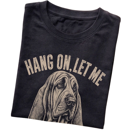 Black T-shirt featuring Overthinking Bloodhound, folded presentation