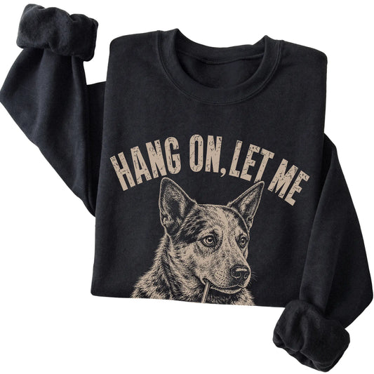 Black crewneck sweatshirt featuring Overthinking American Bulldog, folded presentation