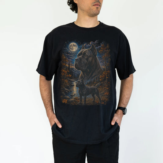 Model wearing a black T-shirt with Cane Corso Autumn Moon artwork.