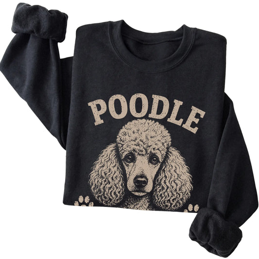 Black crewneck sweatshirt featuring Classy, Clever & Slightly Dramatic - Poodle, folded presentation