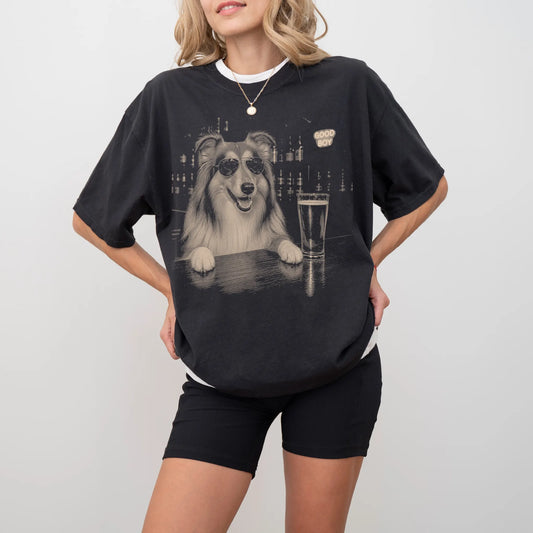 Black Collie at a bar beside a pint, worn in a studio setting