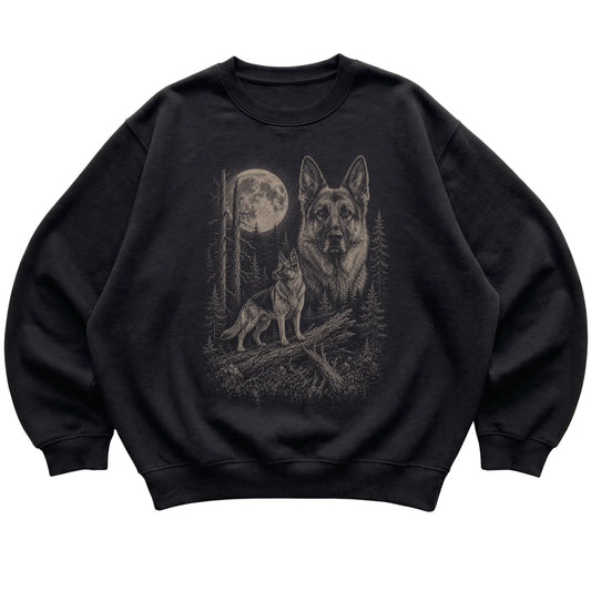 German Shepherd Moonlit Forest graphic on a black crewneck sweatshirt laid flat