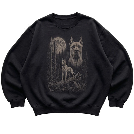 Great Dane Moonlit Forest graphic on a black crewneck sweatshirt laid flat