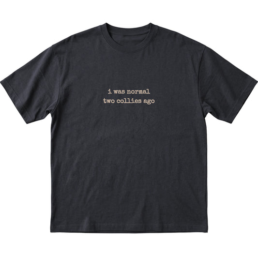 Black I Was Normal Two Collies Ago T-shirt laid flat