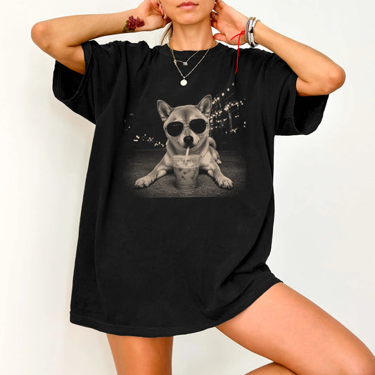 Model wearing a Black Comfort Colors® T-shirt featuring Shiba Inu with iced coffee in a retro grunge design