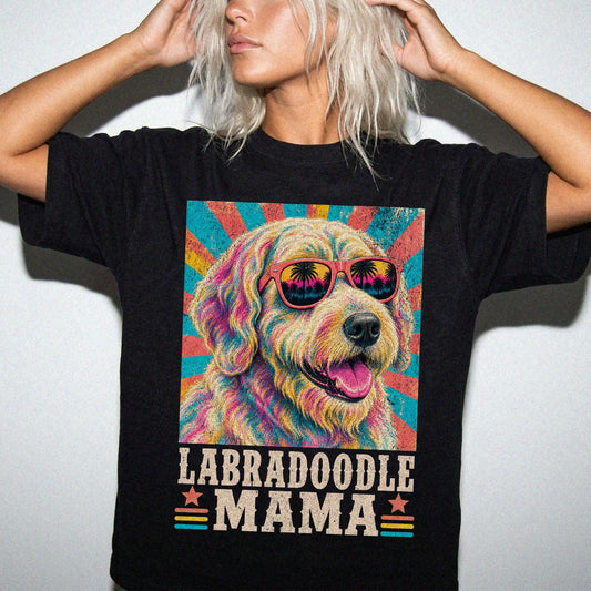 Retro Labradoodle Mama design on a Black Comfort Colors T-shirt worn by a model