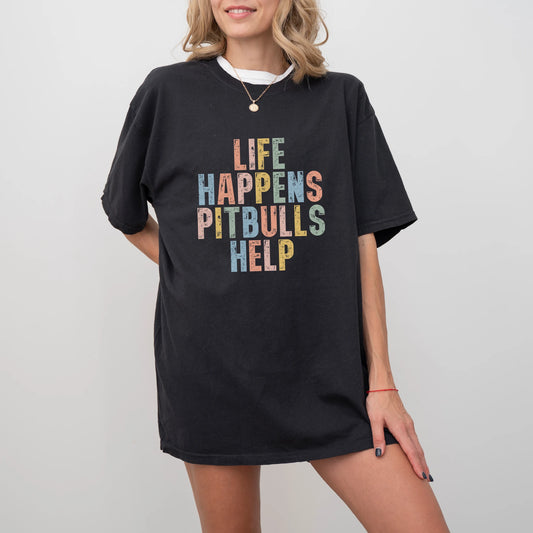 Model wearing a Black Comfort Colors® T-shirt featuring Pitbull making hard days better with “Life Happens, Dogs Help” letter