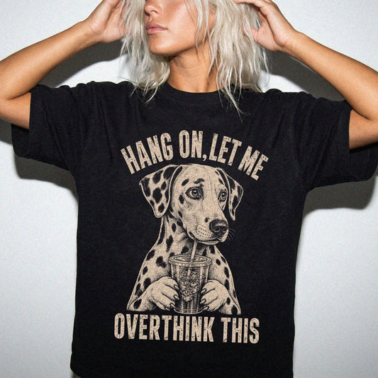 Woman wearing a Black Overthinking Dalmatian T-Shirt