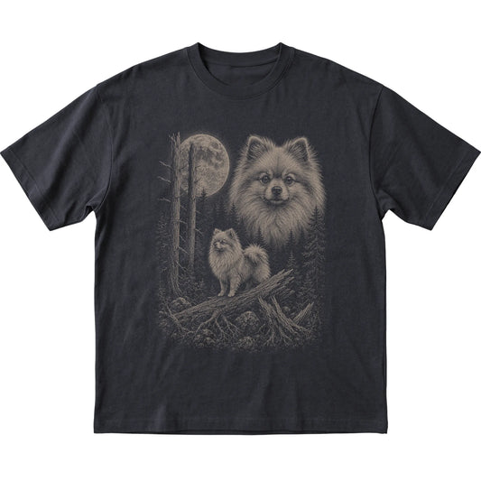 Pomeranian Moonlit Forest graphic on a black Softstyle T-shirt laid flat