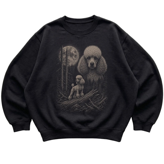 Poodle Moonlit Forest graphic on a black crewneck sweatshirt laid flat
