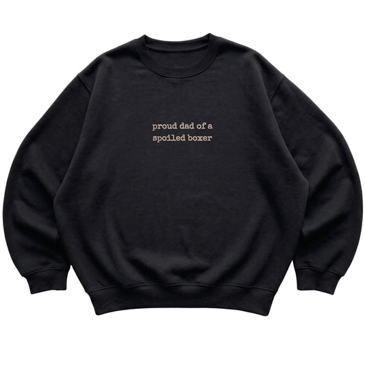 Black Proud Dad of a Spoiled Boxer sweatshirt laid flat