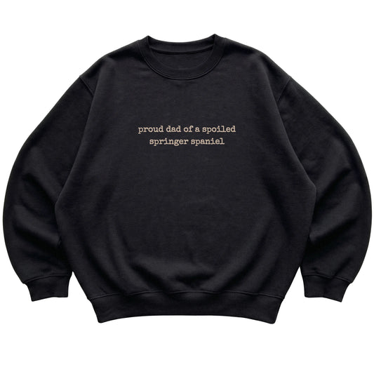Black Proud Dad of a Spoiled Springer Spaniel sweatshirt laid flat