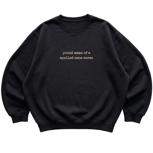 Black Proud Mama of a Spoiled Cane Corso sweatshirt laid flat