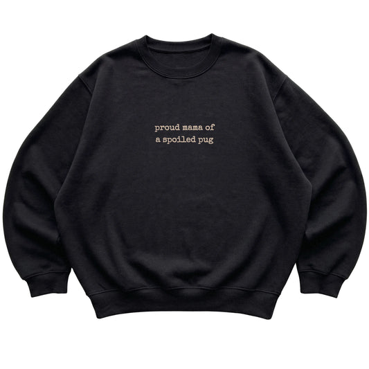 Black Proud Mama of a Spoiled Pug sweatshirt laid flat