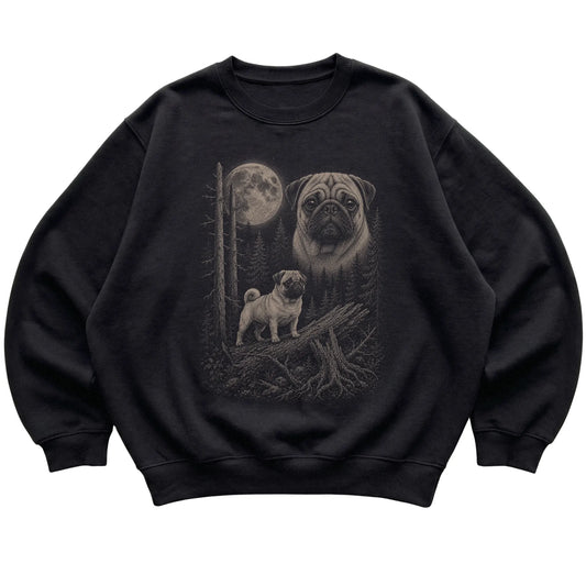 Pug Moonlit Forest graphic on a black crewneck sweatshirt laid flat