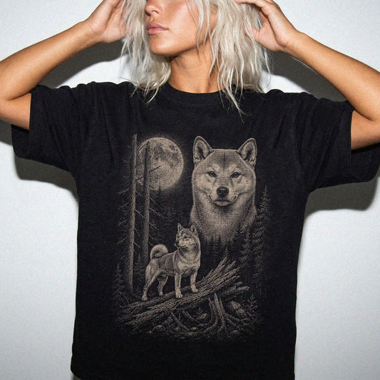 Woman wearing a Black Shiba Inu Moonlit Forest T-Shirt