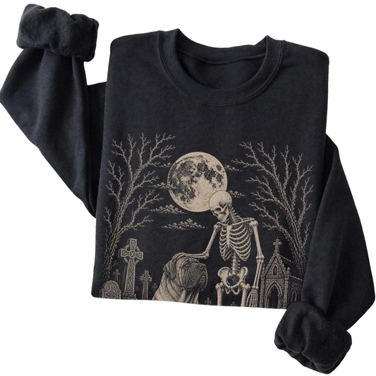 Folded Black sweatshirt with a skeleton petting a Mastiff in a graveyard
