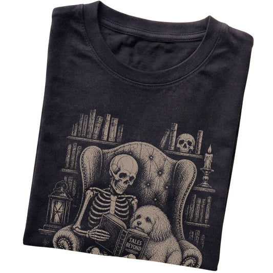 Folded Black T-shirt with a skeleton reading Tales Beyond to a Havanese