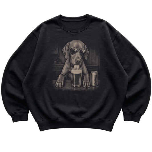 Black Vizsla drinking from a pint at a bar, laid flat