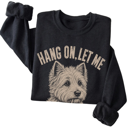 Black crewneck sweatshirt featuring Overthinking Westie, folded presentation