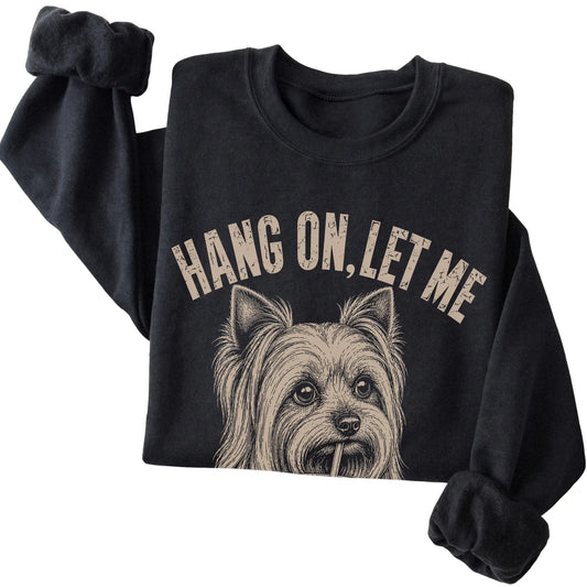 Black crewneck sweatshirt featuring Overthinking American Bulldog, folded presentation