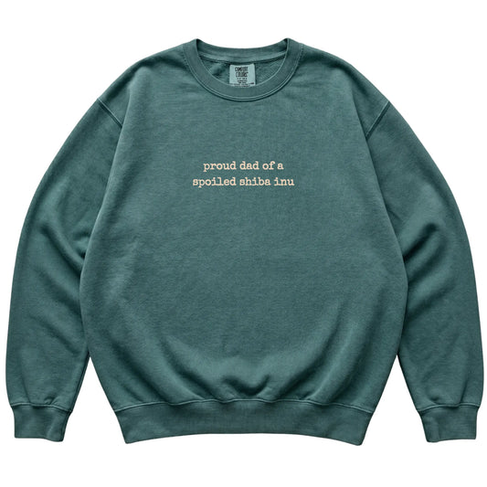 Blue Spruce Proud Dad of a Spoiled Shiba Inu Comfort Colors sweatshirt laid flat