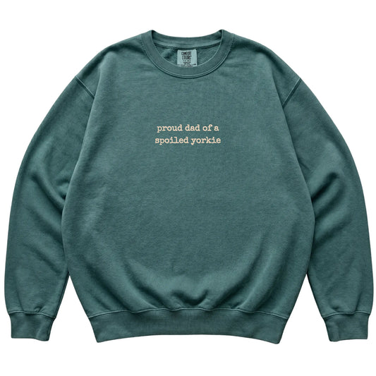 Blue Spruce Proud Dad of a Spoiled Yorkie Comfort Colors sweatshirt laid flat