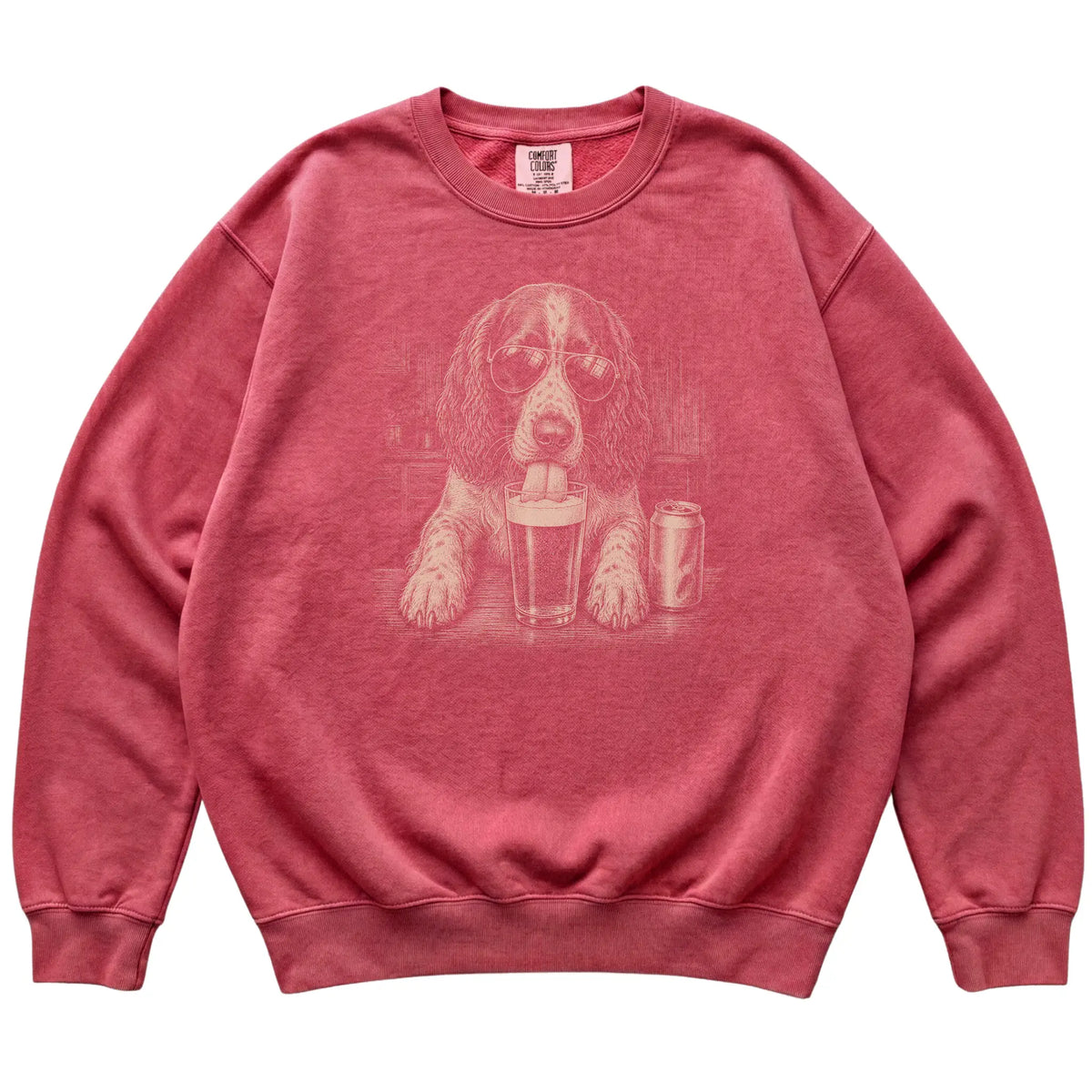 Crimson Springer Spaniel drinking from a pint at a bar, laid flat