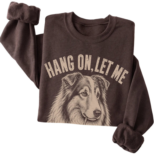 Dark Chocolate crewneck sweatshirt featuring Overthinking Collie, folded presentation