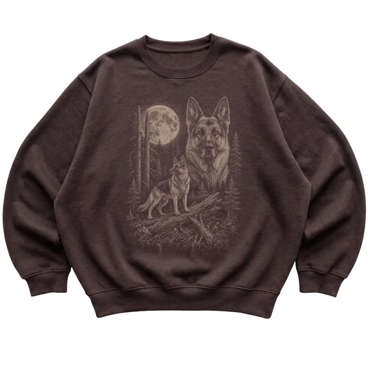 German Shepherd Moonlit Forest graphic on a dark chocolate crewneck sweatshirt laid flat