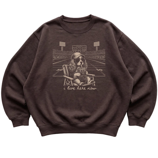 Dark Chocolate I live here now Cavalier King Charles Spaniel sweatshirt, laid flat