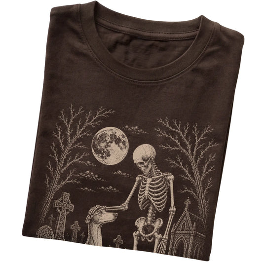 Folded Dark Chocolate T-shirt with a skeleton petting a Greyhound in a graveyard