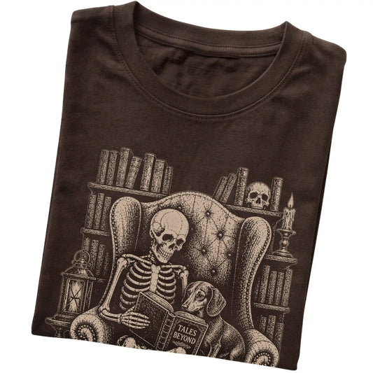 Folded Dark Chocolate T-shirt with a skeleton reading Tales Beyond to a Dachshund