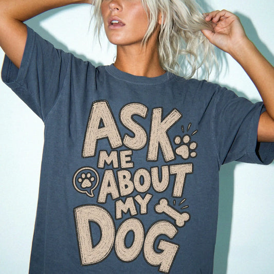 Model wearing a Denim Comfort Colors® T-shirt with “Ask me about my dog” lettering