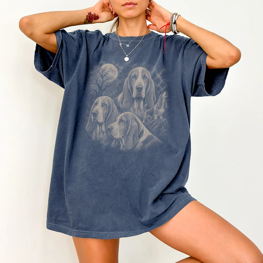 Model wearing a Denim Comfort Colors® T-shirt with a vintage moon montage featuring Basset Hound