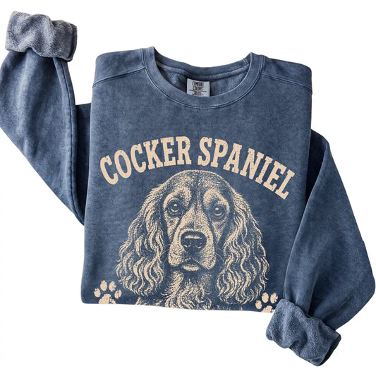 Denim Comfort Colors® sweatshirt featuring Big Feelings, Better Hair - Cocker Spaniel, folded presentation