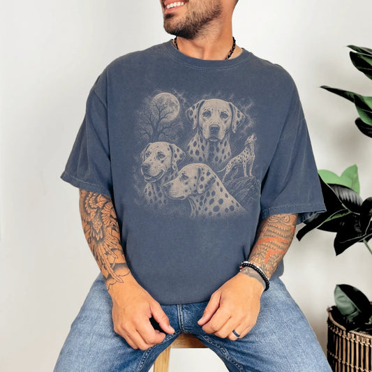 Model wearing a Denim Comfort Colors® T-shirt with a vintage moon montage featuring Dalmatian
