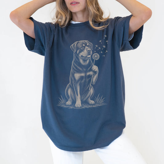 Model wearing a Denim Comfort Colors® T-shirt showing Rottweiler portrait with drifting dandelion seeds