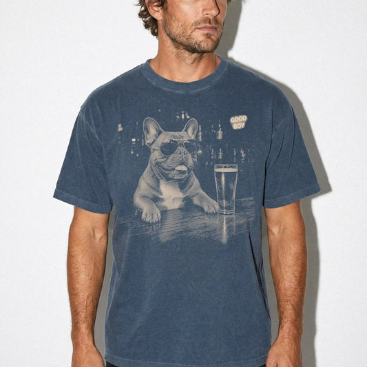 Denim Frenchie at a bar beside a pint, worn in a studio setting