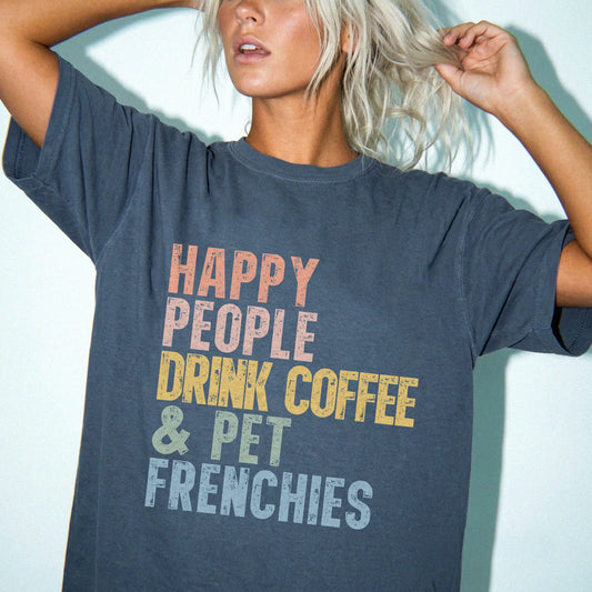 Model wearing a Denim Comfort Colors® T-shirt featuring French Bulldog with coffee and “Happy People Drink Coffee and Pet Dog