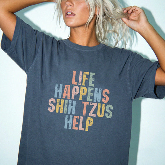 Model wearing a Denim Comfort Colors® T-shirt with retro “Life Happens, Shih Tzus Help” lettering