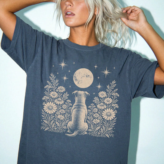 Model wearing a Denim Comfort Colors® T-shirt featuring Pitbull beneath a wildflower moon