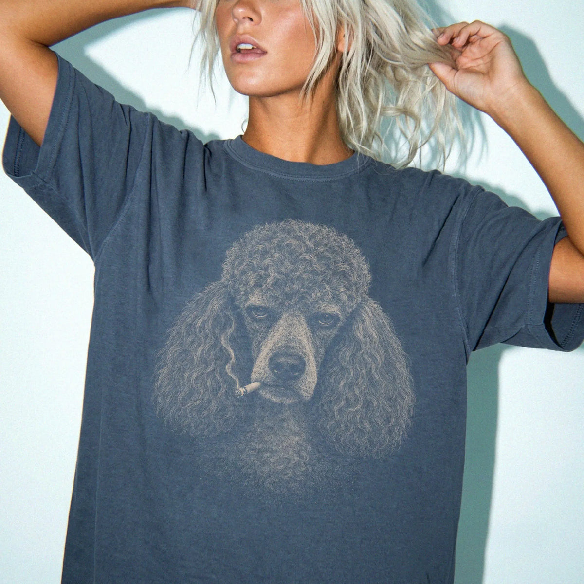 Model wearing a Poodle smoking design on a Denim t-shirt