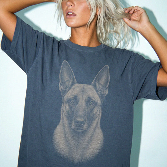 Model wearing a Denim Comfort Colors® T-shirt with a realistic drawing of a Belgian Malinois