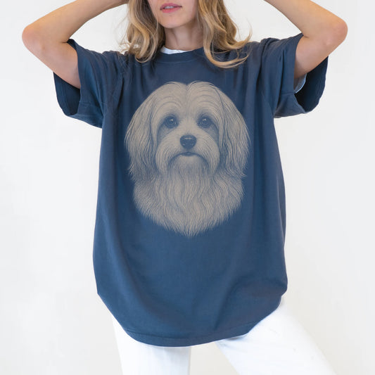 Model wearing a Denim Comfort Colors® T-shirt with a realistic drawing of a Havanese