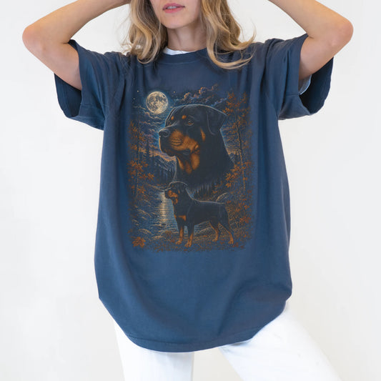 Model wearing a denim T-shirt with Rottweiler Autumn Moon artwork.
